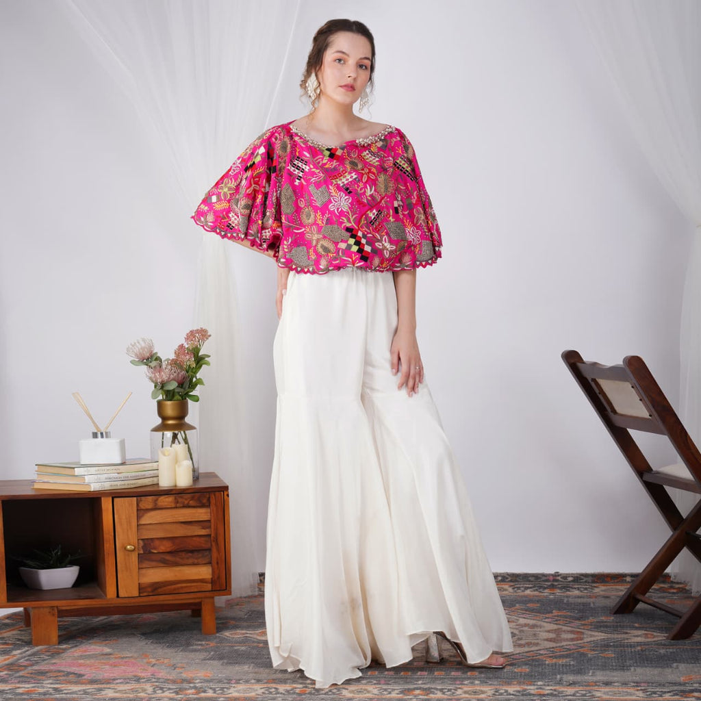 Pink pearl-embroidered Zardosi silk cape with white skirt front view